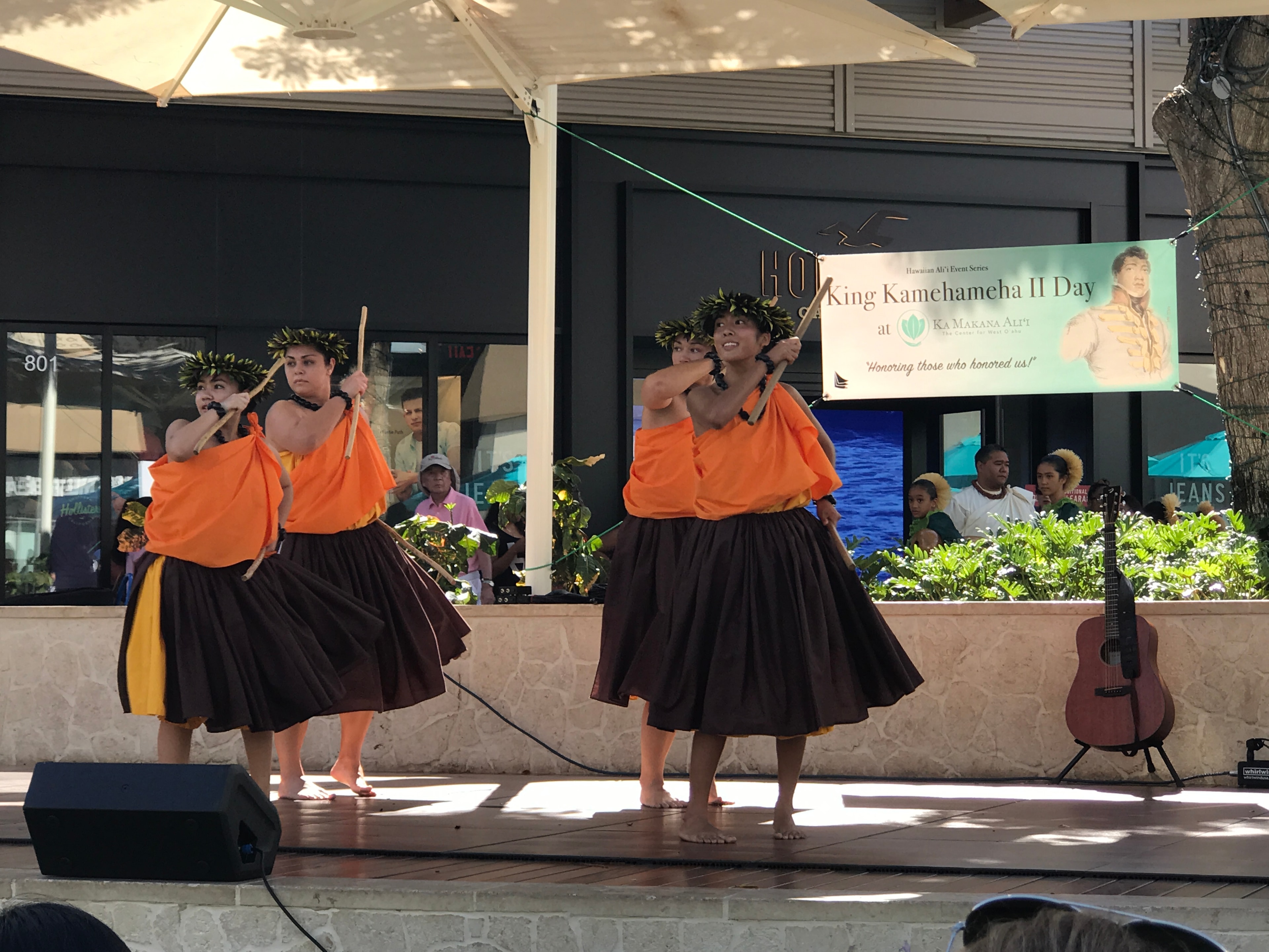 Hawaiian dancers performing traditional hula ceremony
