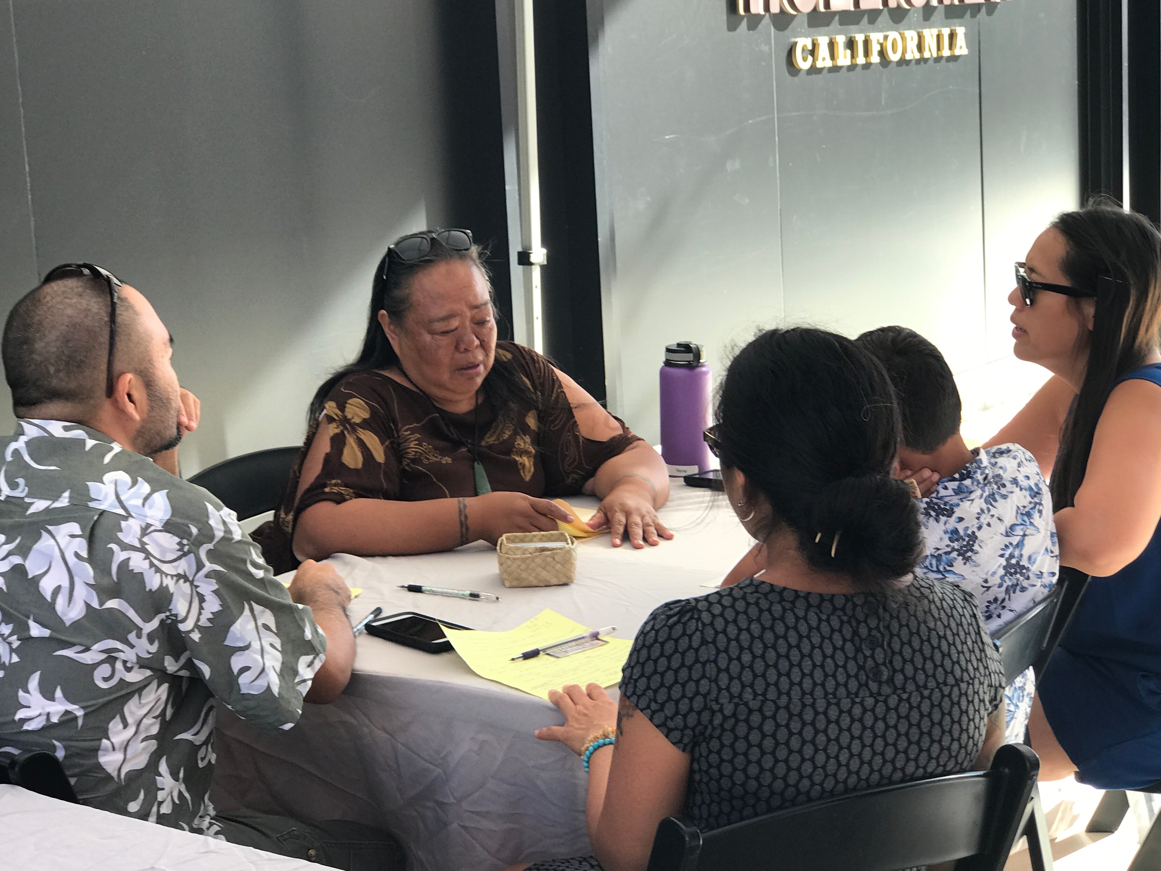 Group meeting discussion around table