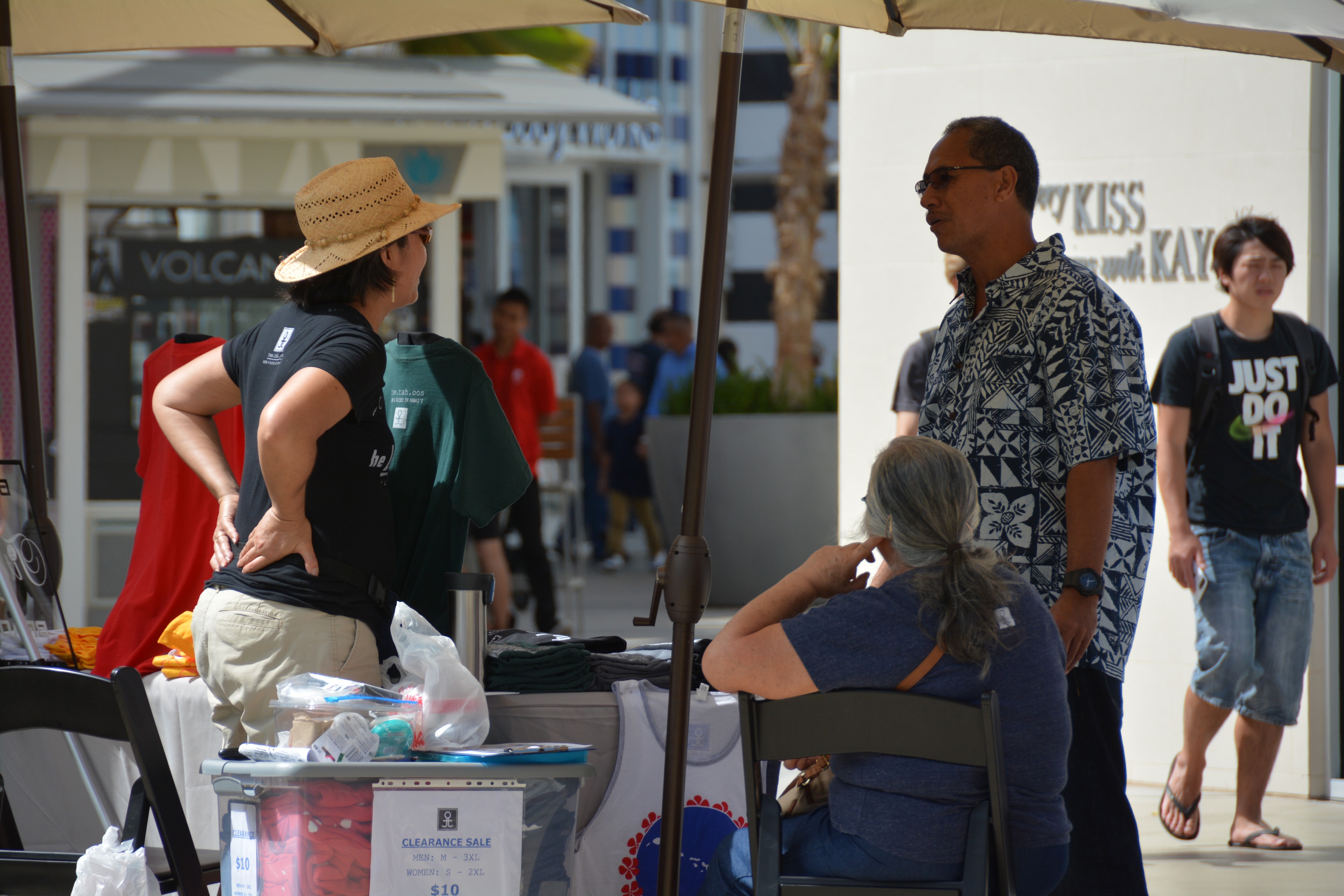 People shopping at outdoor mall clearance sale