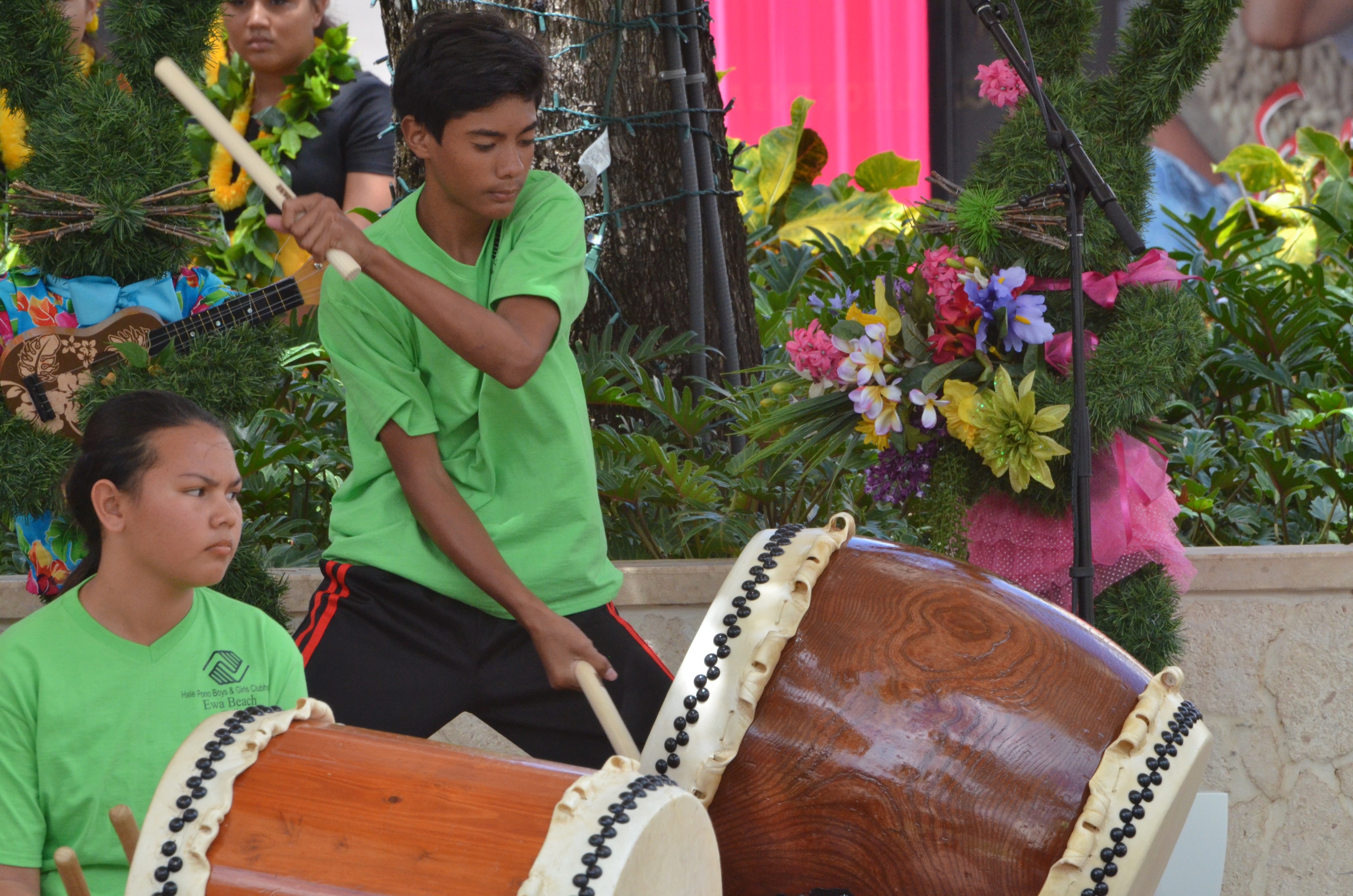 Young musicians performing with traditional drums