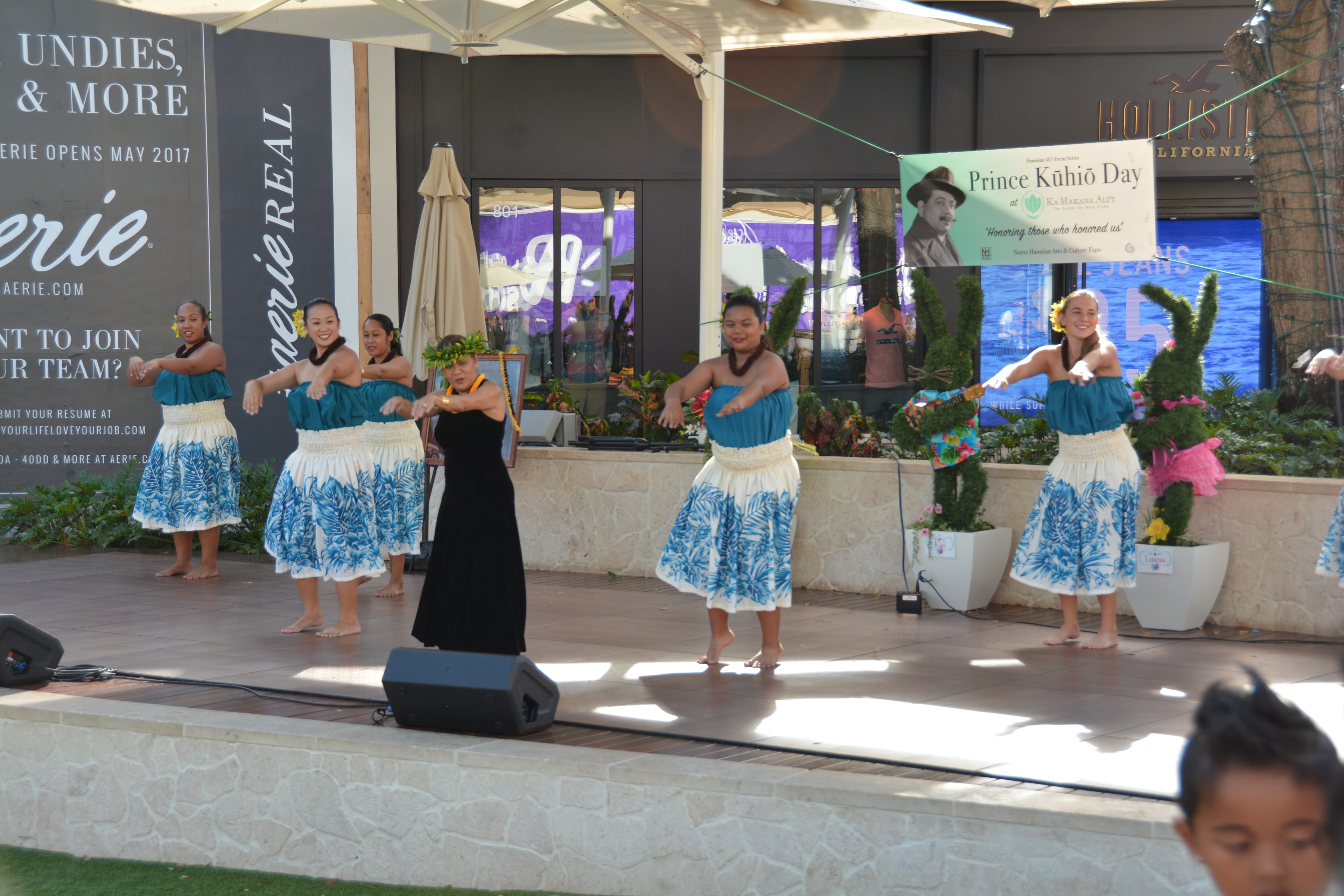 Hawaiian hula dancers performing outdoor event