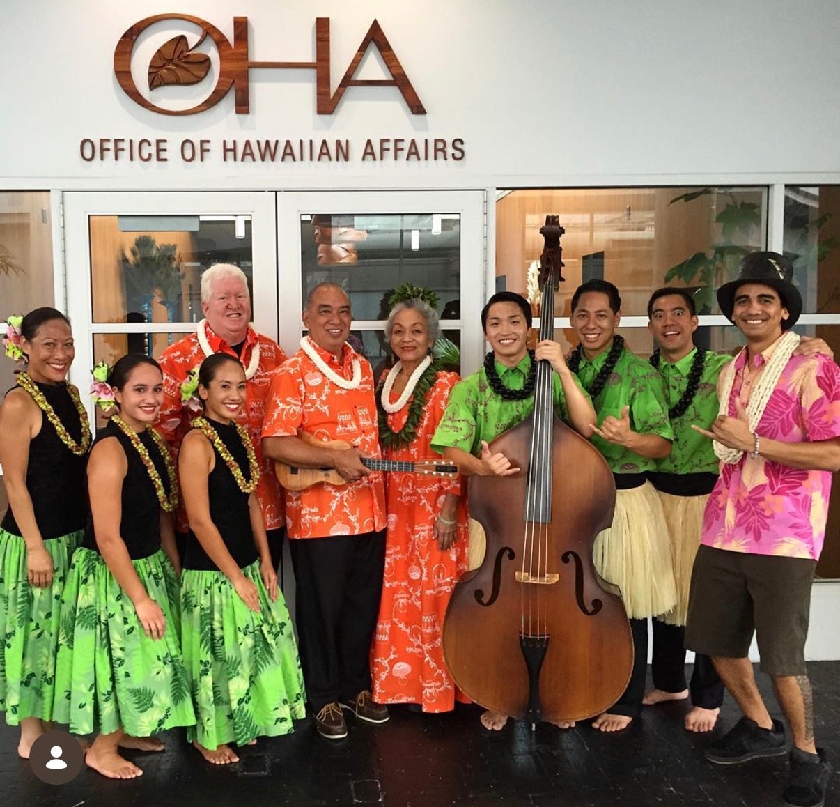 Hawaiian musicians performing at office Hawaiian event
