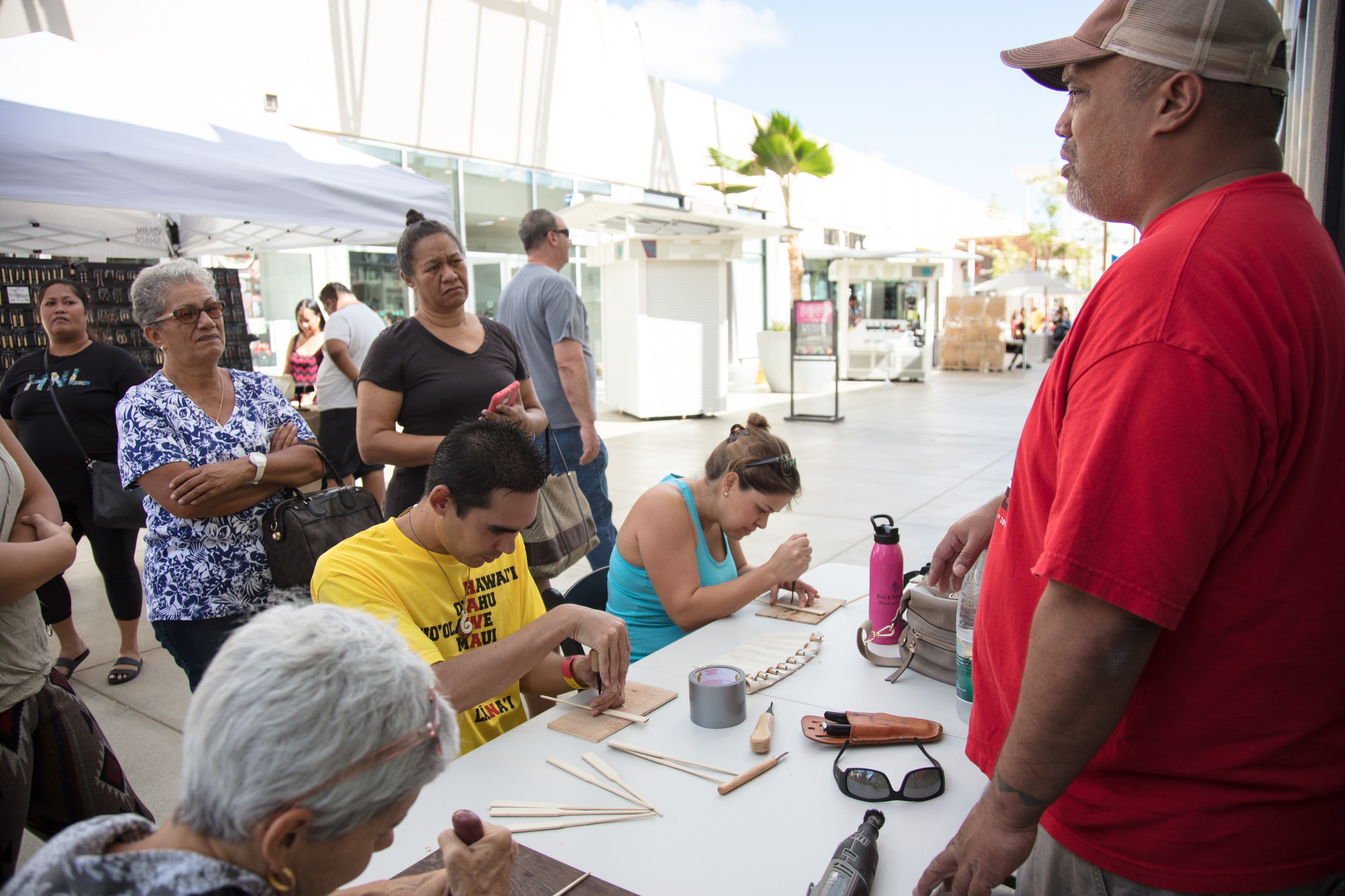 Outdoor community craft workshop demonstration