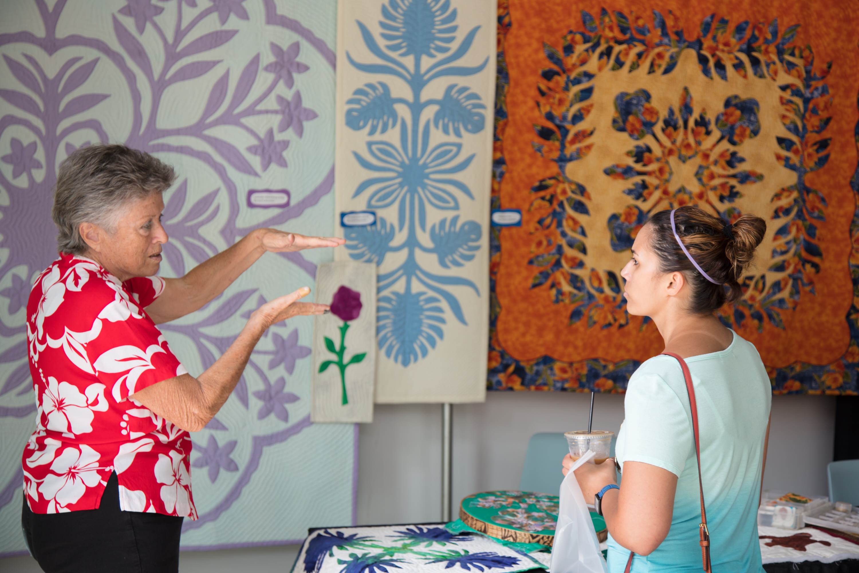 Woman teaching textile design patterns