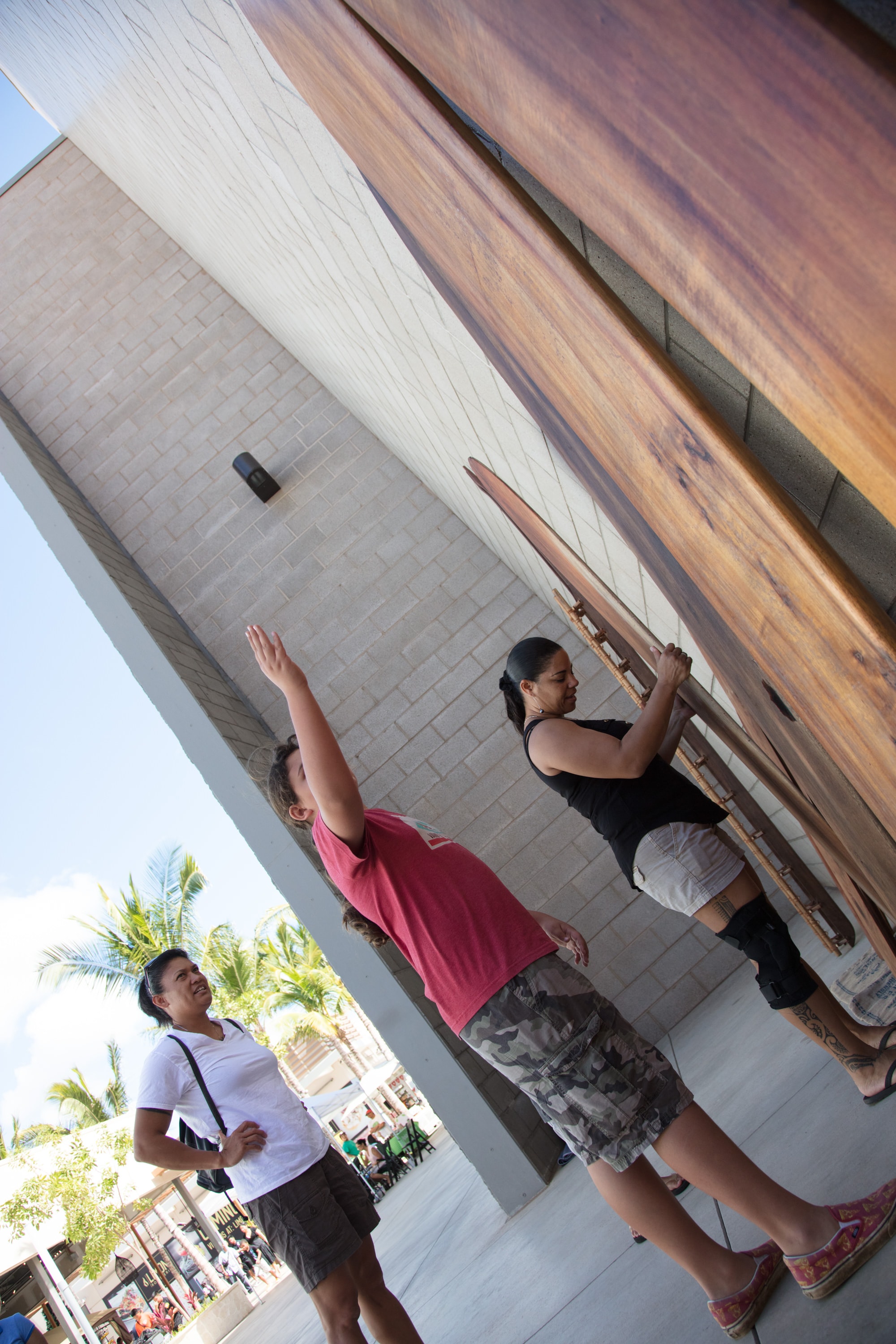 People playing ladder toss outdoors