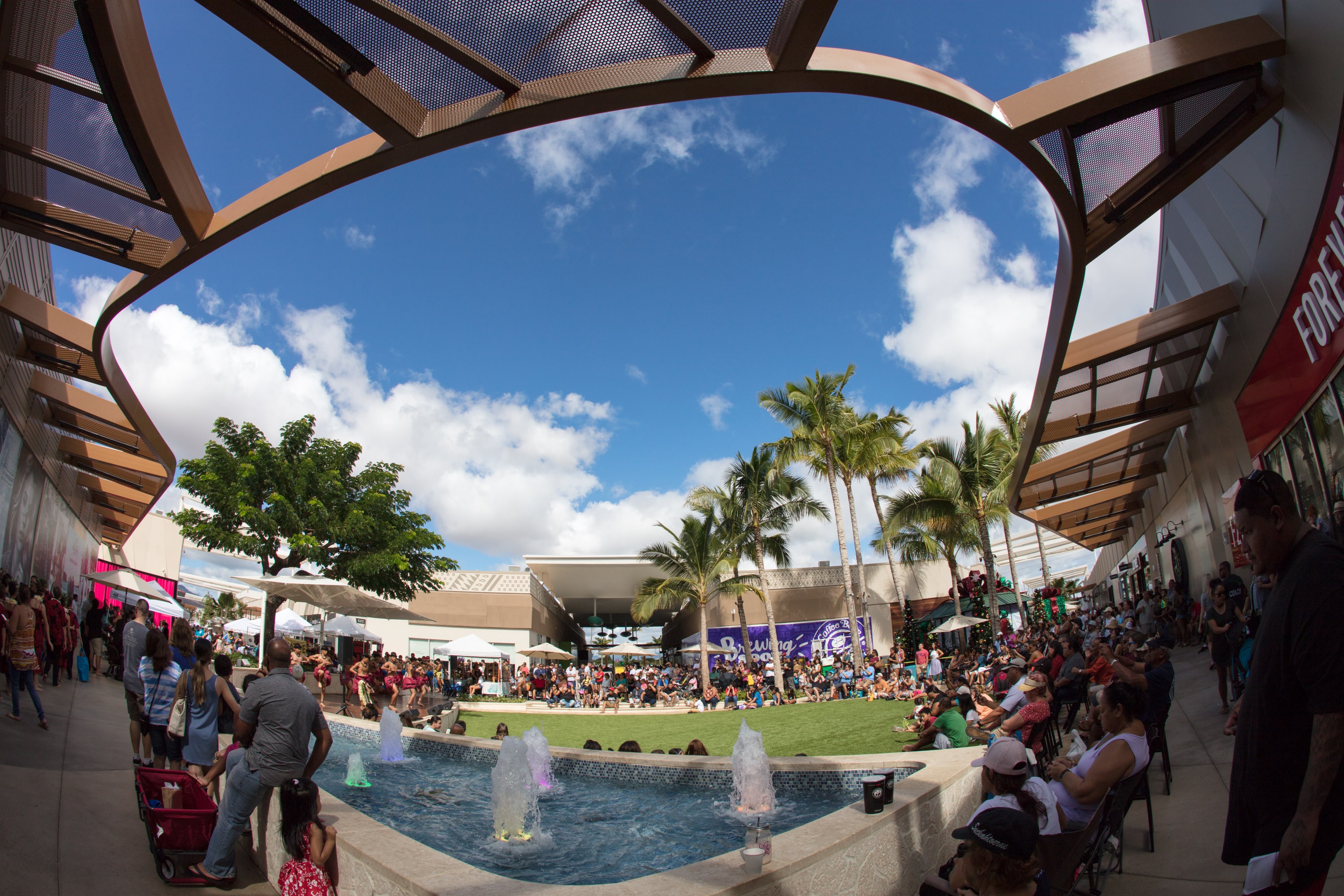 Outdoor shopping mall courtyard with fountain