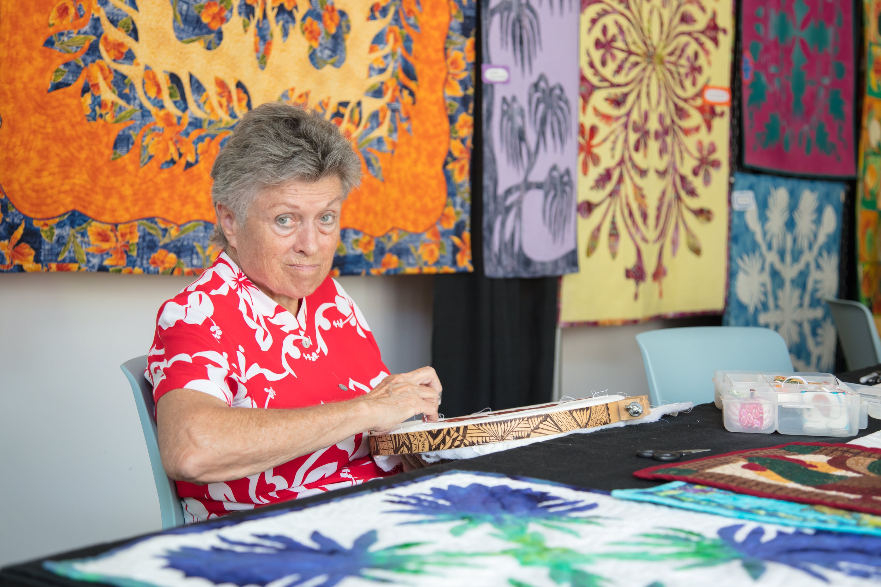Textile artist working with patterned fabrics