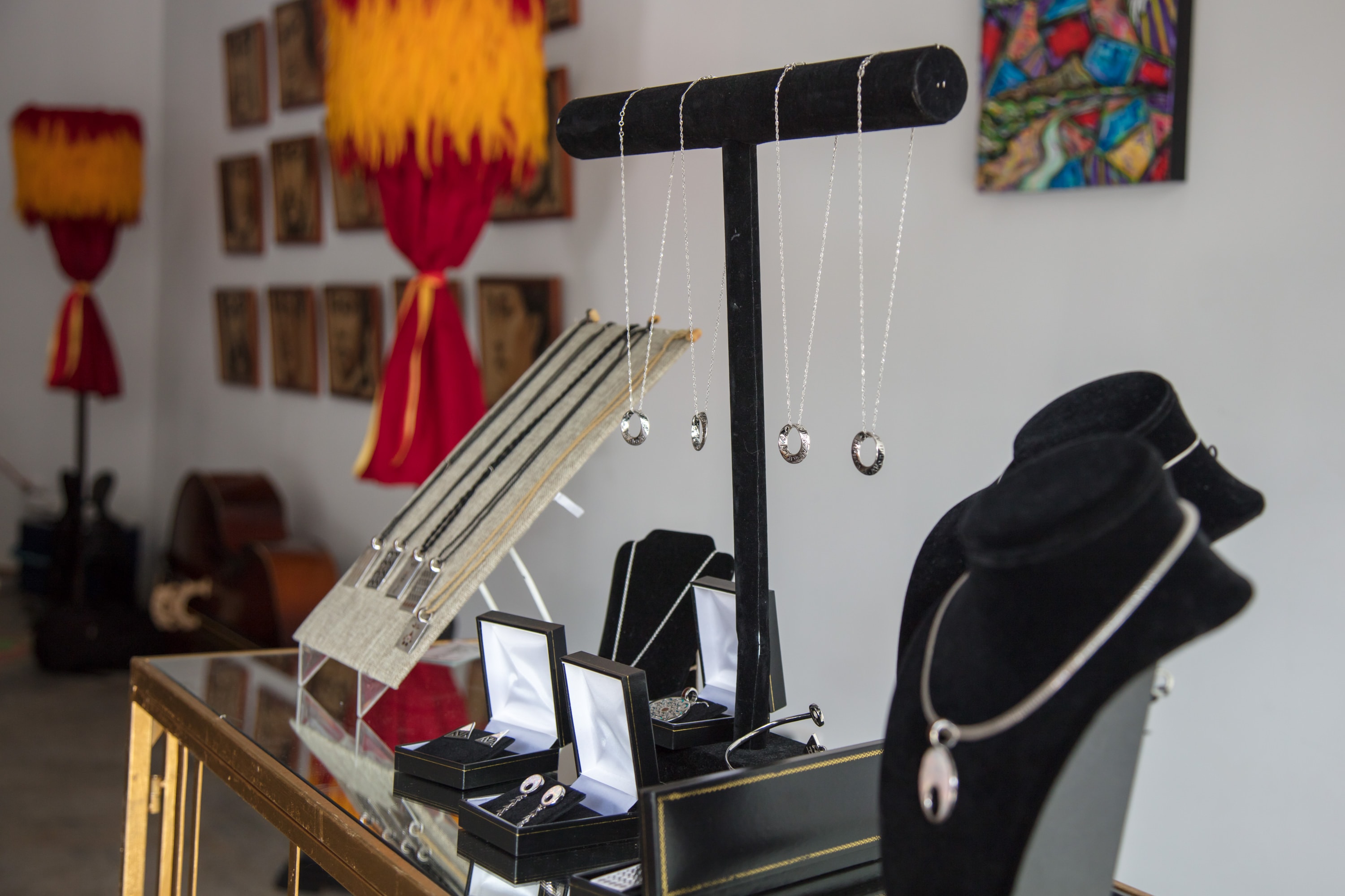 Jewelry display with necklaces and mannequin