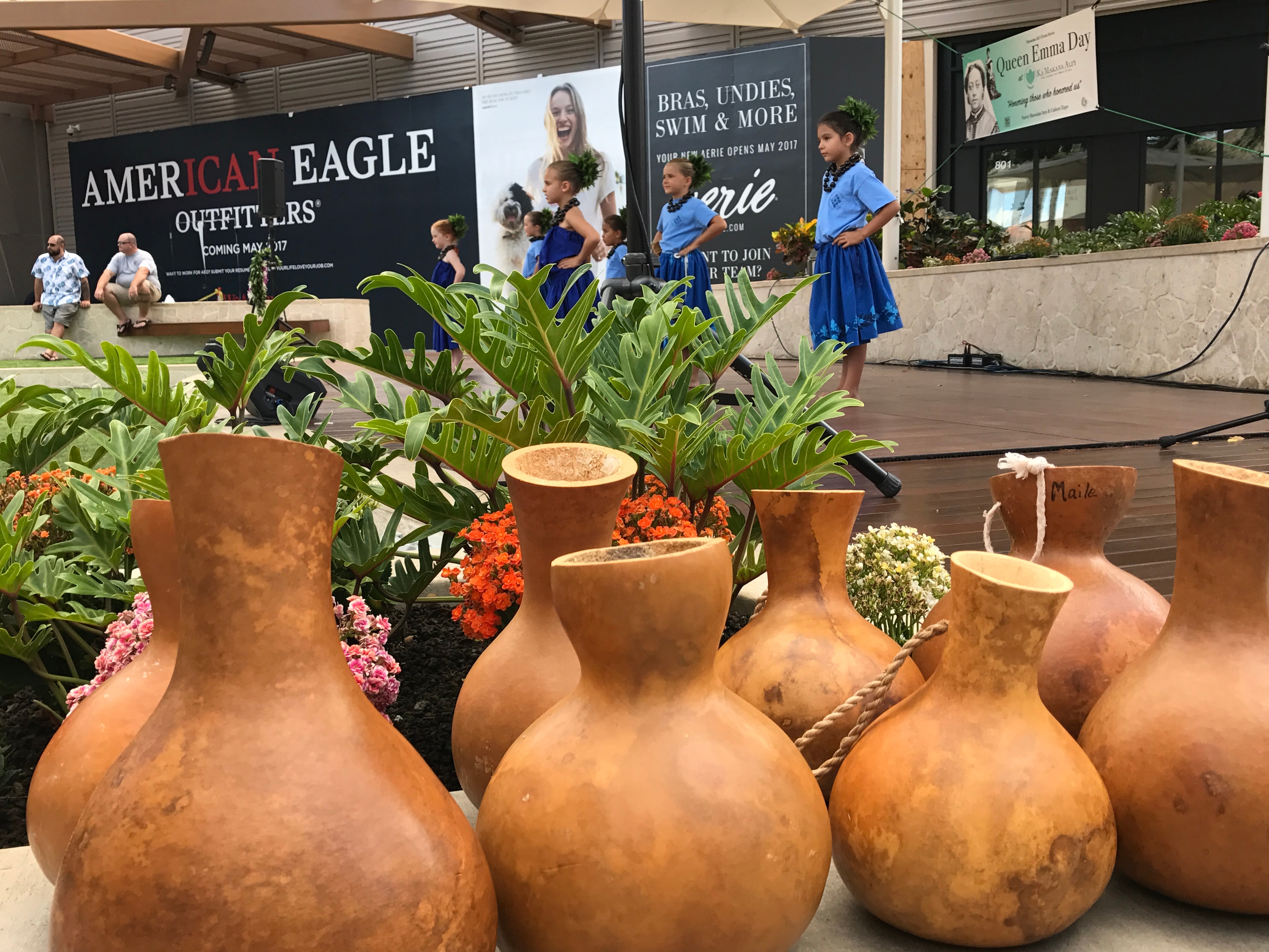 Children performing on outdoor mall stage