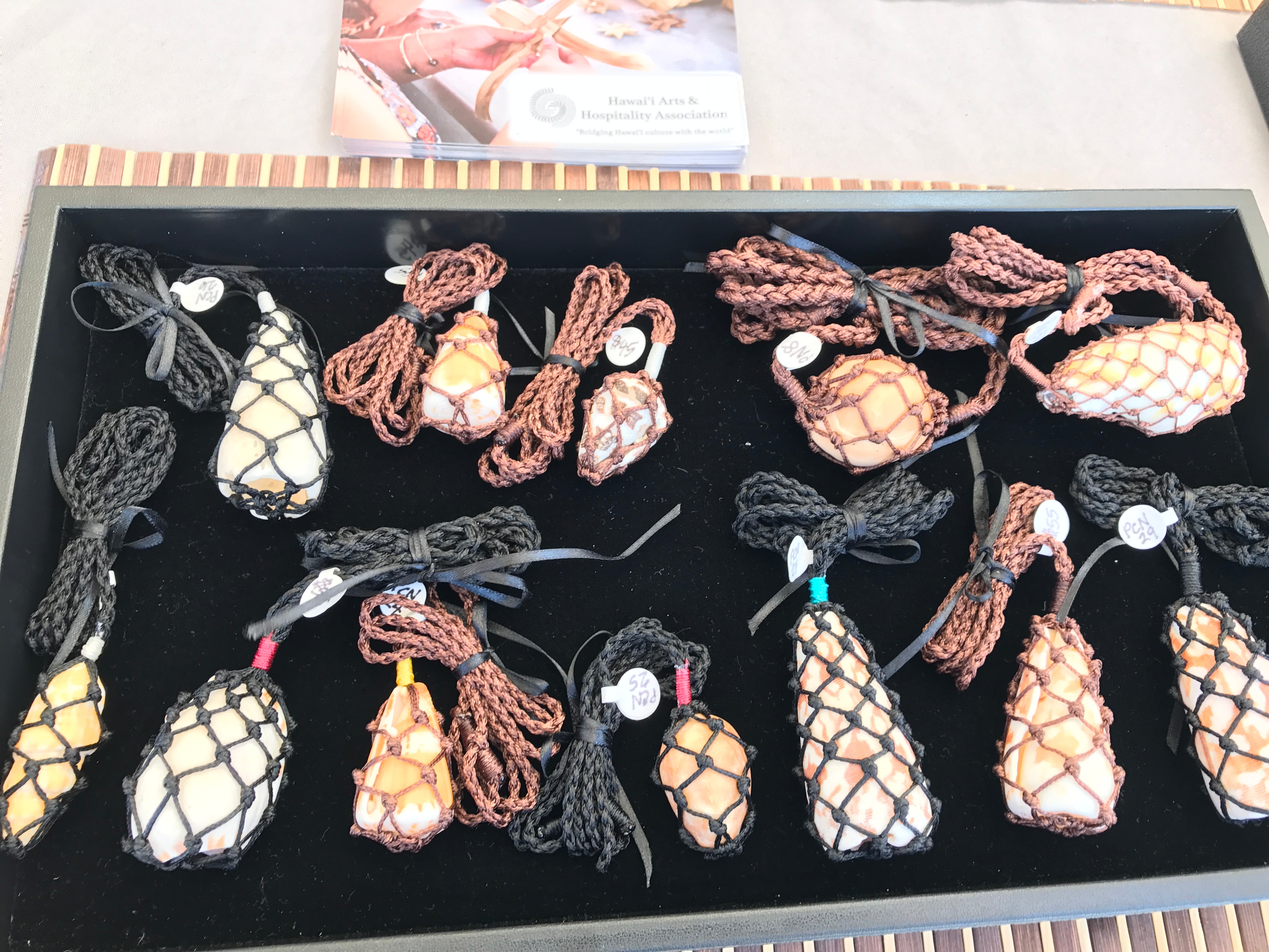 Handmade net pouches with shells ornaments