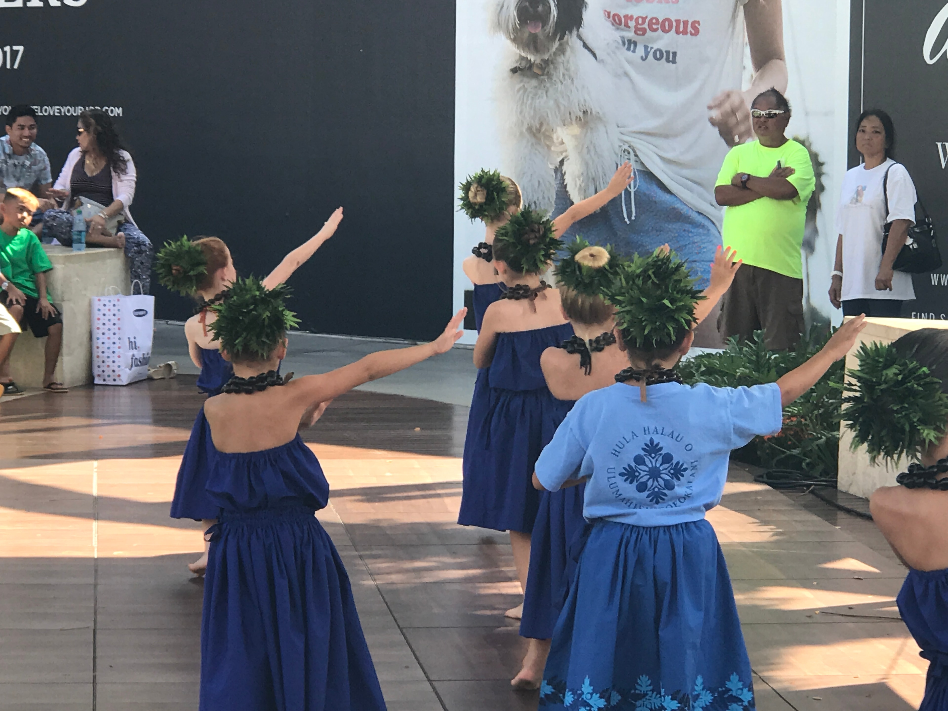 Children performing Hawaiian hula dance on stage