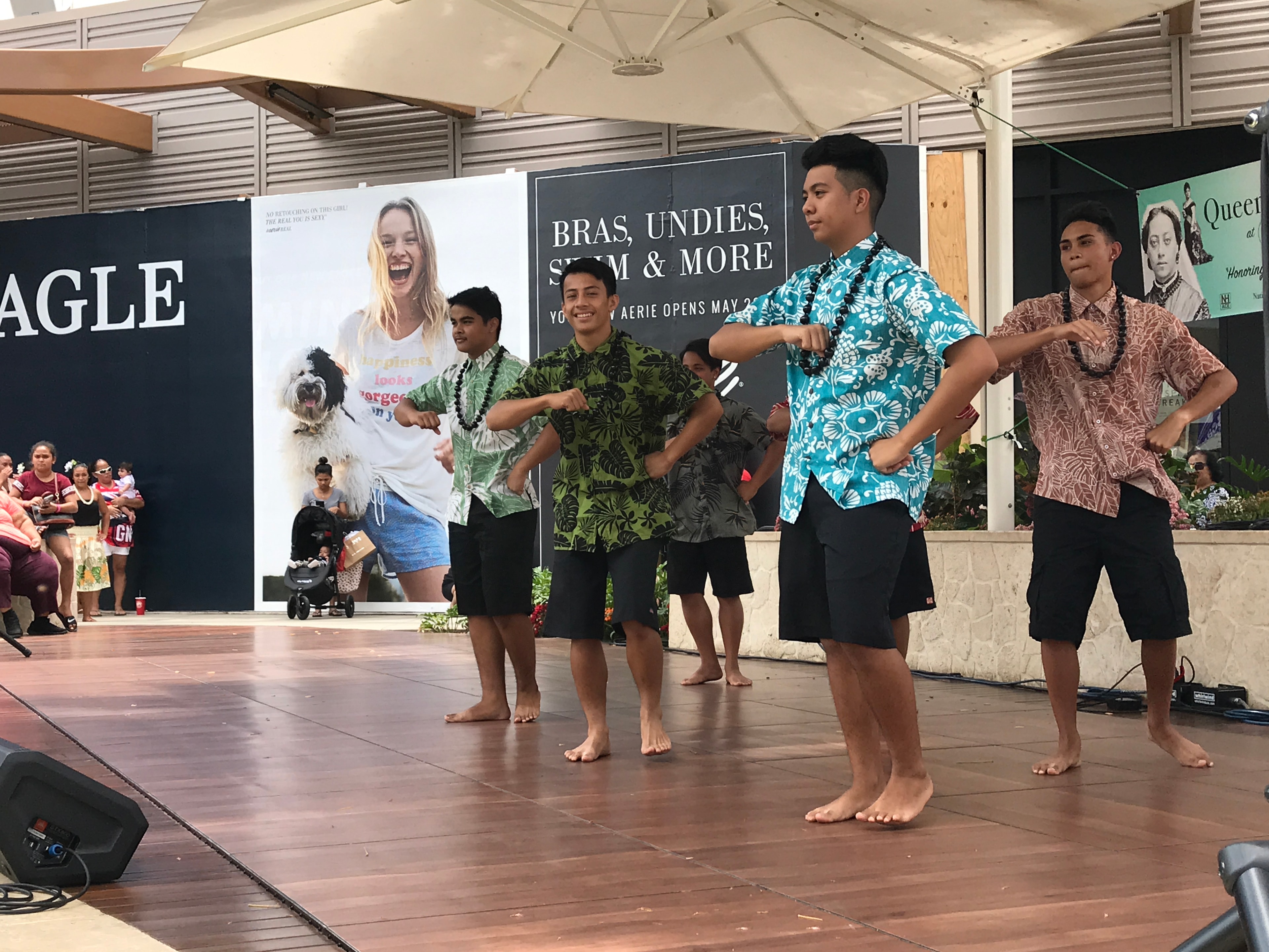 Men performing traditional Hawaiian dance outdoors